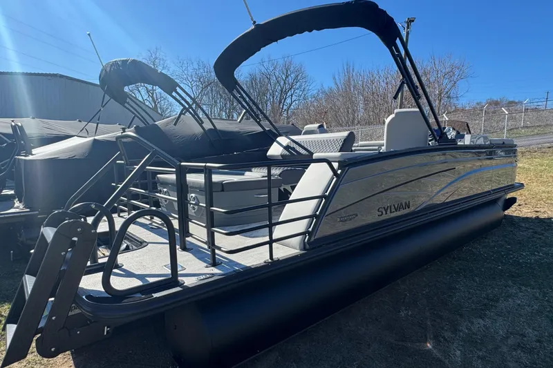 Slide: The Image of 2026 Sylvan L3 DLZ pontoon boat with sleek design and modern features. - 23