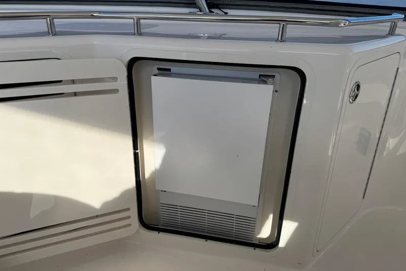 Slide: The Image of 2007 Sea Ray 58 Sedan Bridge yacht interior with built-in storage compartment. - 18