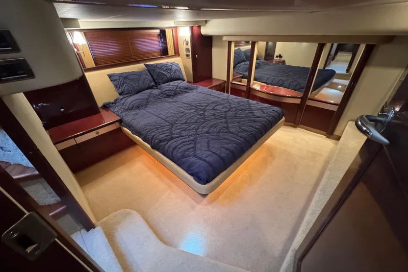 Slide: The Image of Luxurious bedroom interior of 2007 Sea Ray 58 Sedan Bridge yacht. - 42