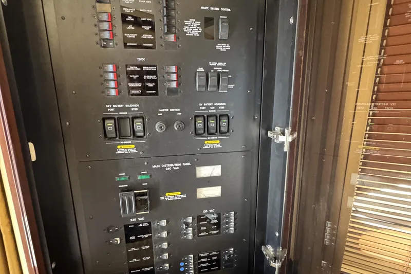 Slide: The Image of Electrical control panel on a 2007 Sea Ray 58 Sedan Bridge yacht. - 49