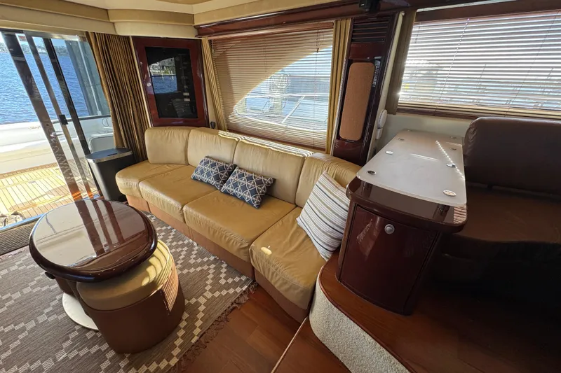 Slide: The Image of Luxurious interior of 2007 Sea Ray 58 Sedan Bridge yacht with leather seating and elegant decor. - 29