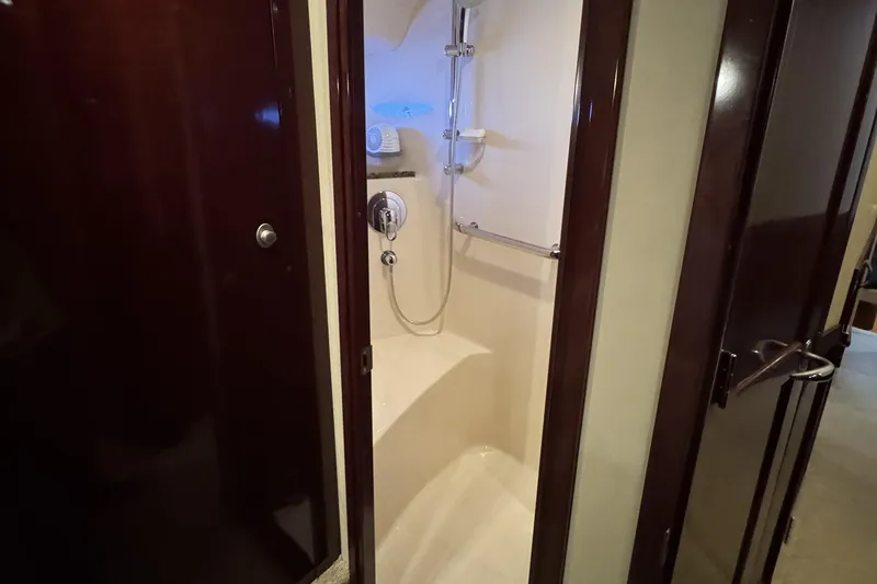 Slide: The Image of Shower area in 2007 Sea Ray 58 Sedan Bridge yacht, featuring sleek design and modern fixtures. - 35