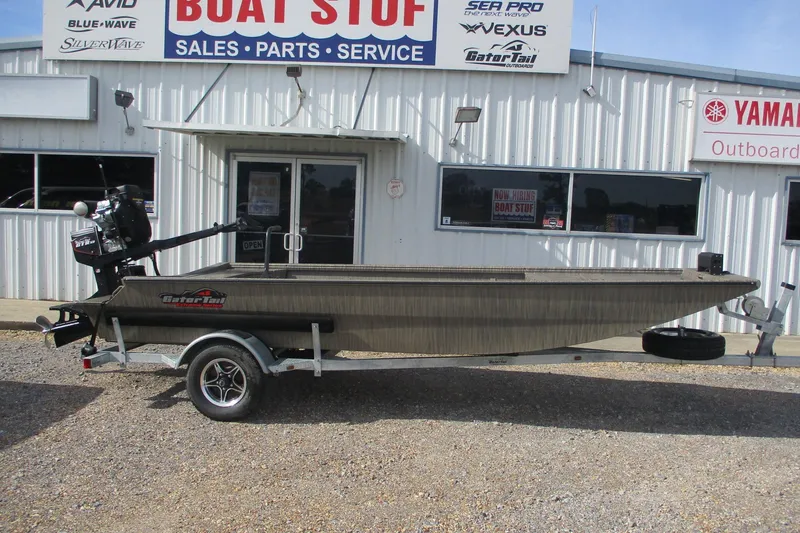 The Image of 2026 Gator Tail 1754 Extreme boat on trailer outside dealership. - 0