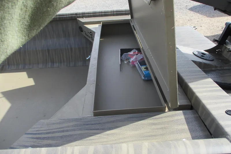 Slide: The Image of Open storage compartment in 2026 Gator Tail 1754 Extreme boat interior. - 8