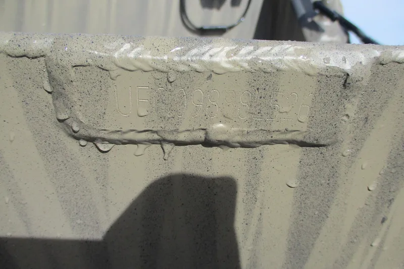 Slide: The Image of Close-up of Gator Tail 1754 Extreme 2026 hull identification number. - 9