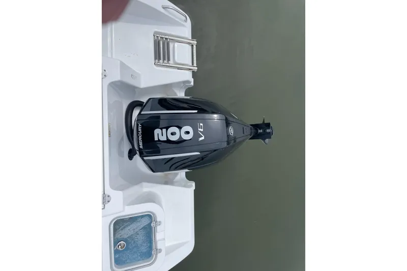 Slide: The Image of 2024 NauticStar 222L Offshore with Mercury 200 V6 outboard engine, top view. - 6