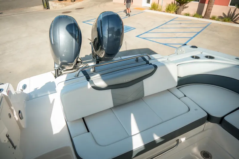 Slide: The Image of 2021 Chaparral 280 OSX boat with dual engines and luxurious seating. - 14