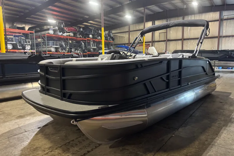 The Image of 2026 Evotti 521CS pontoon boat in warehouse, sleek black design, modern features. - 0