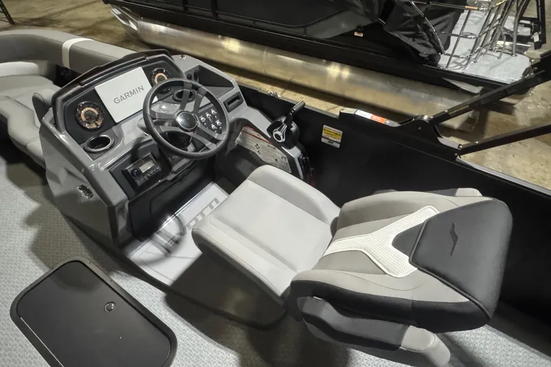 Slide: The Image of Interior of 2026 Evotti 521CS boat with Garmin dashboard and modern seating. - 11