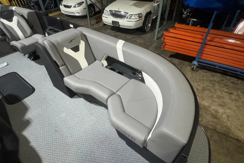 Slide: The Image of Luxurious seating in 2026 Evotti 521CS boat, featuring sleek gray upholstery. - 6