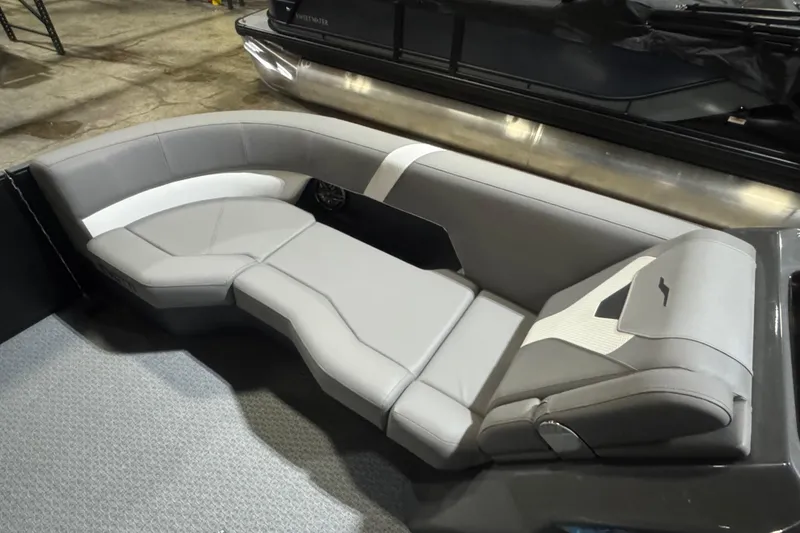 Slide: The Image of Luxurious seating in the 2026 Evotti 521CS boat, featuring sleek gray upholstery. - 8