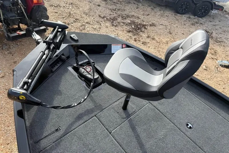 Slide: The Image of 2026 Lowe Stinger 195 Bass boat deck with seat and trolling motor. - 11
