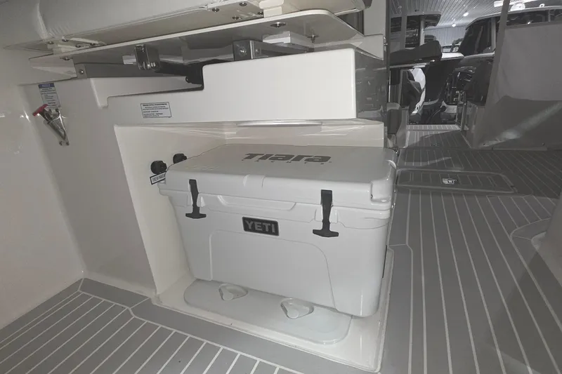 Slide: The Image of Dashboard of 2023 Tiara Sport 34LX boat with dual Garmin displays and controls. - 19