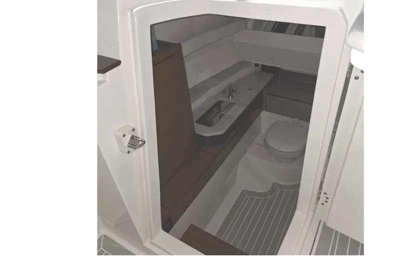 Slide: The Image of Garmin displays on 2023 Tiara Sport 34LX boat dashboard. - 21