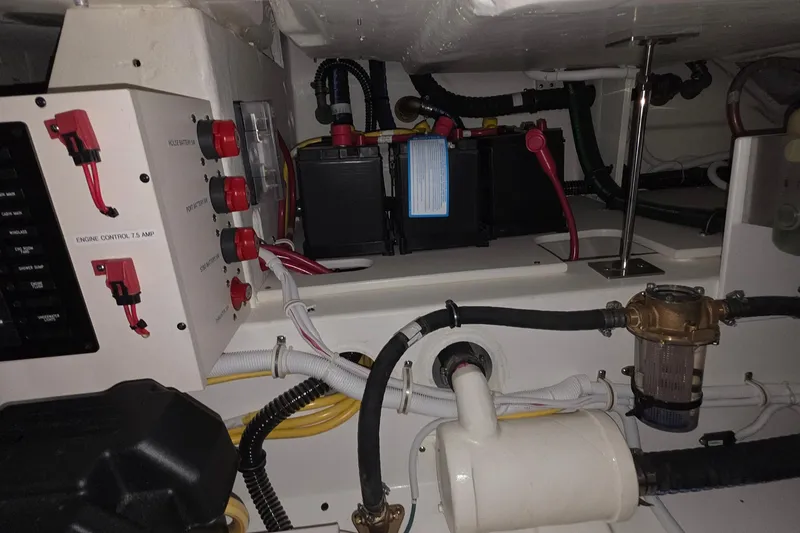 Slide: The Image of 2023 Tiara Sport 34LX boat interior bathroom with sink and toilet. - 38