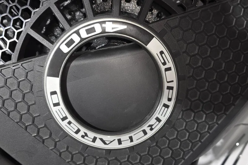 Slide: The Image of Electrical control panel of 2023 Tiara Sport 34LX boat, featuring AC and DC systems. - 40