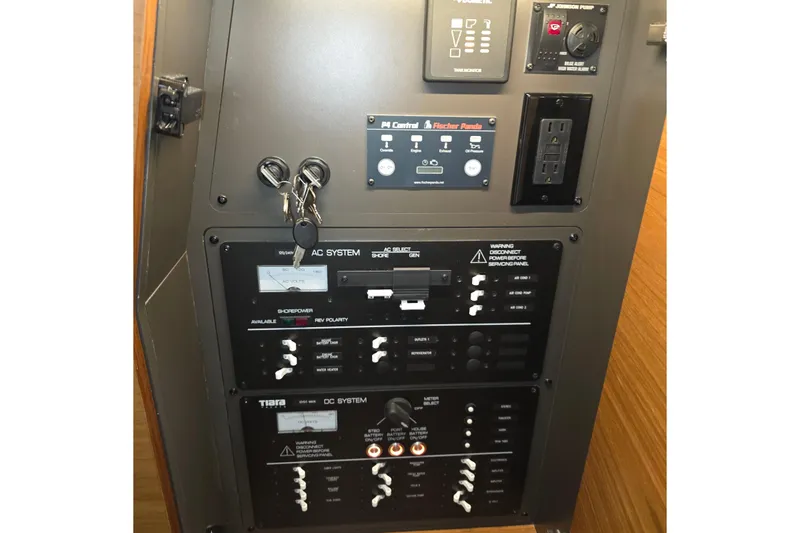 Slide: The Image of Luxurious seating on 2023 Tiara Sport 34LX boat with elegant stitching and integrated speaker. - 48