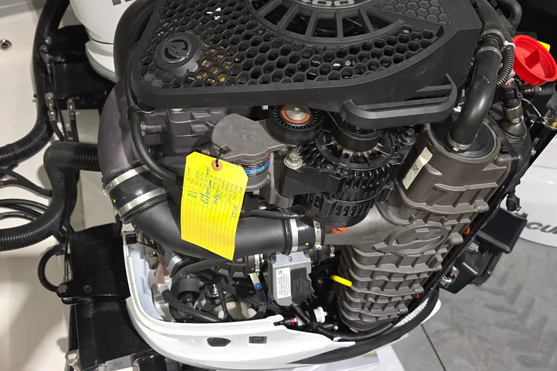 Slide: The Image of Engine compartment of 2023 Tiara Sport 34LX, showcasing complex wiring and components. - 54