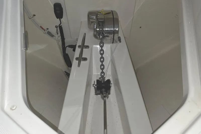 Slide: The Image of Twin Mercury outboard engines on a 2023 Tiara Sport 34LX boat. - 61