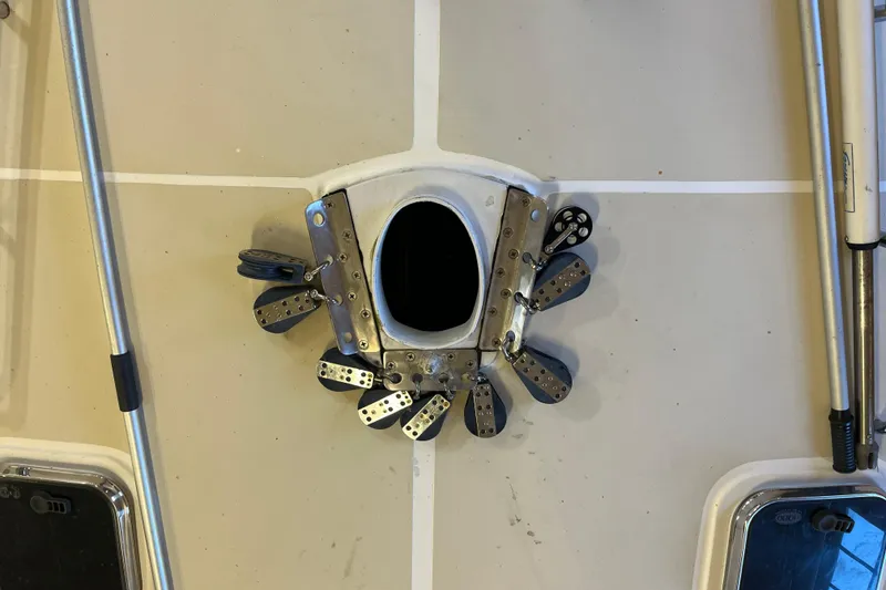 Slide: The Image of Deck hardware on a 2001 Tartan 3700 Sloop sailboat, featuring winches and cleats. - 10