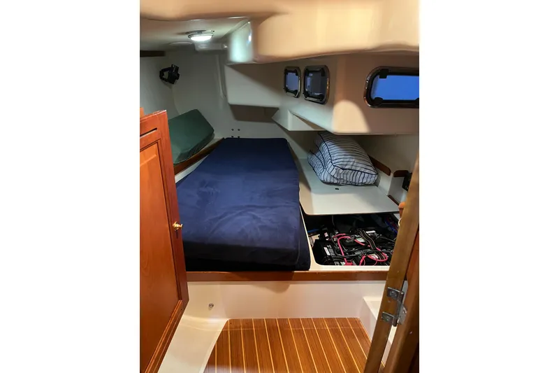 Slide: The Image of Interior cabin of 2001 Tartan 3700 Sloop with bed and storage compartments. - 6