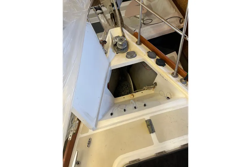 Slide: The Image of Tartan 3700 Sloop 2001 deck view with open hatch and winch. - 9