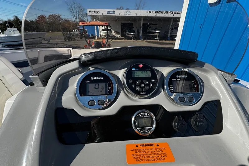 Slide: The Image of Dashboard of 2019 Chaparral 191 Suncoast boat with Yamaha gauges and warning label. - 8