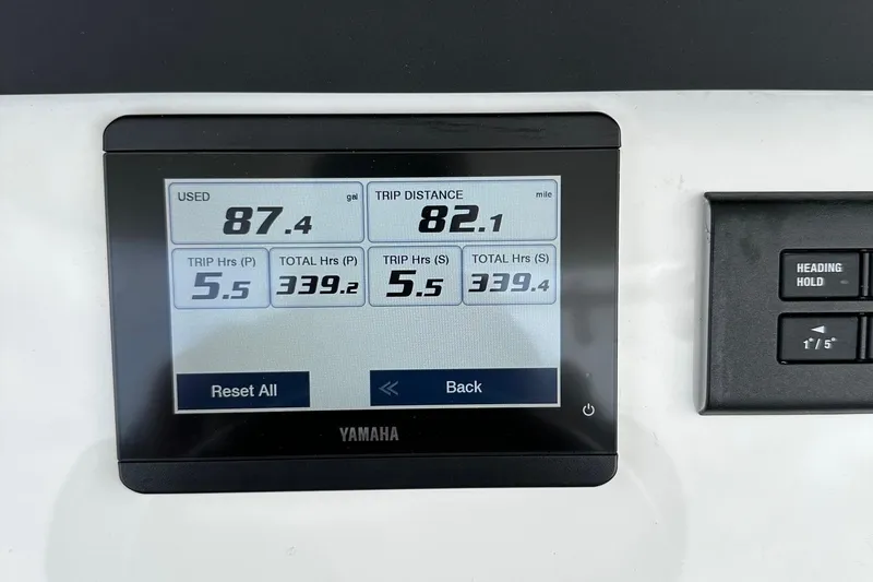 Slide: The Image of Yamaha display showing trip data on a 2023 Regulator 34 boat. - 23