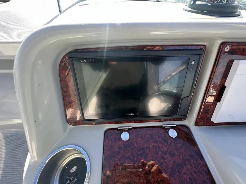 Slide: The Image of Garmin GPS display on 2005 Formula 330 Sun Sport boat dashboard. - 14