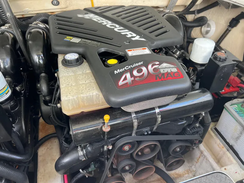 Slide: The Image of 2005 Formula 330 Sun Sport engine compartment with MerCruiser 496 MAG engine. - 17