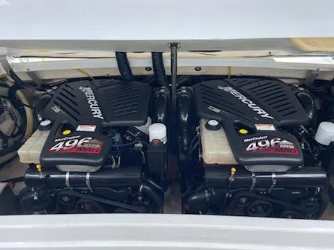 Slide: The Image of Twin MerCruiser engines in a 2005 Formula 330 Sun Sport boat. - 23