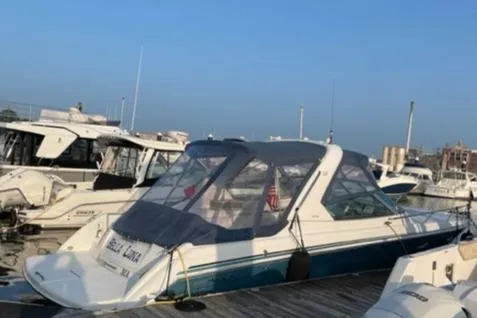 Slide: The Image of 2005 Formula 330 Sun Sport boat docked at marina. - 7