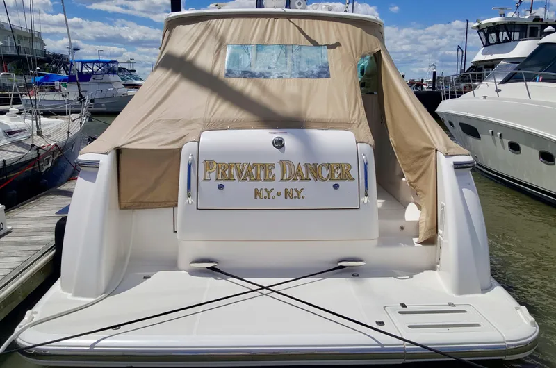 Slide: The Image of 2008 Tiara Yachts 3900 Sovran Private Dancer docked at marina. - 2