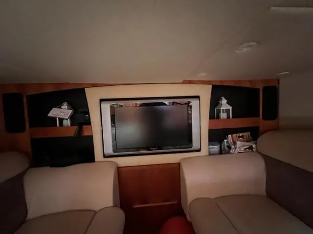 Slide: The Image of Interior of 2008 Tiara Yachts 3900 Sovran with TV and seating area. - 27