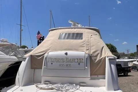 Slide: The Image of 2008 Tiara Yachts 3900 Sovran docked, rear view with cover and Private Dancer name. - 7