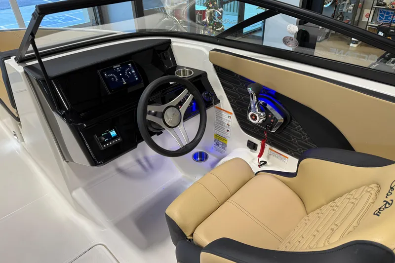 Slide: The Image of 2026 Sea Ray SPX 210 Outboard boat interior with modern dashboard and steering wheel. - 33