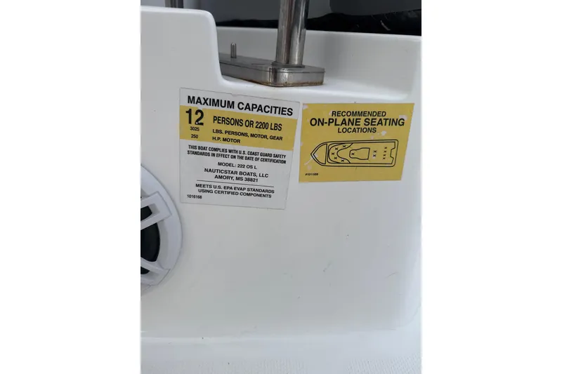 Slide: The Image of 2024 NauticStar 222L Offshore capacity label, seating diagram, and compliance details. - 10