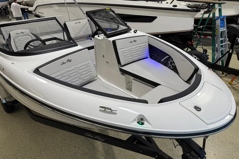 Slide: The Image of 2026 Sea Ray SPX 210 boat interior with sleek design and modern features. - 16