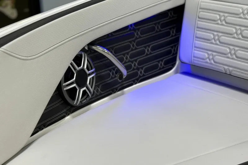 Slide: The Image of 2026 Sea Ray SPX 210 interior detail with speaker and ambient lighting. - 19