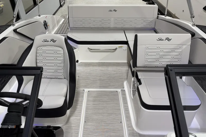 Slide: The Image of 2026 Sea Ray SPX 210 boat interior with sleek, modern seating and stylish design. - 20