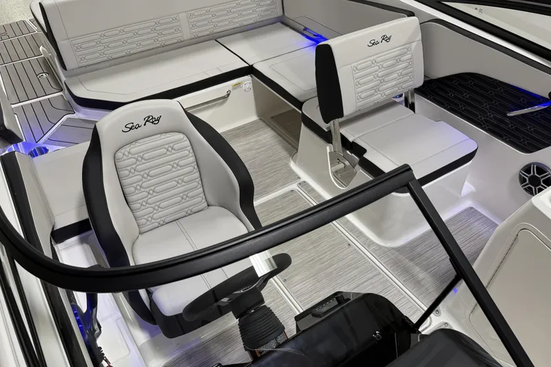 Slide: The Image of Interior of 2026 Sea Ray SPX 210 boat with modern seating and sleek design. - 26