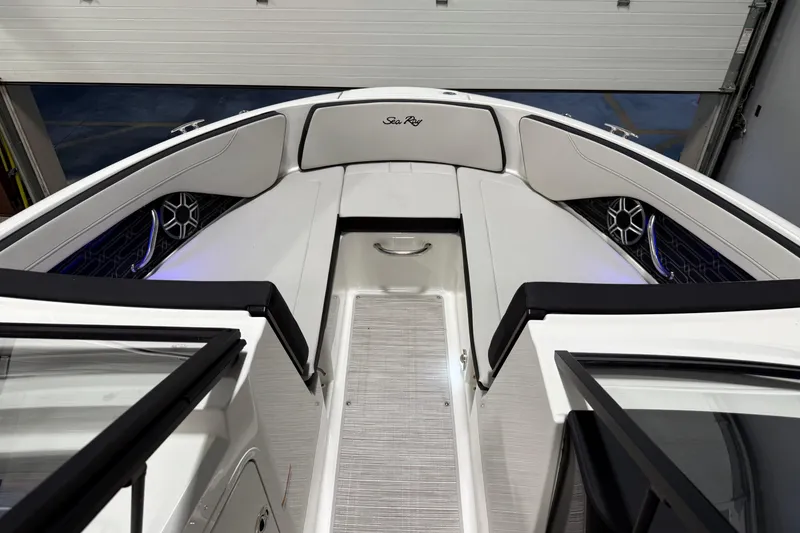 Slide: The Image of 2026 Sea Ray SPX 210 boat interior with sleek seating and modern design. - 37