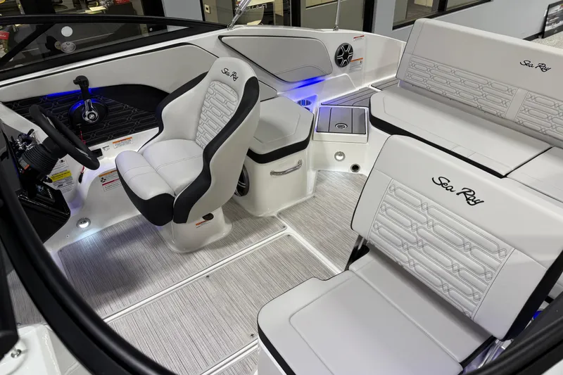 Slide: The Image of 2026 Sea Ray SPX 210 boat interior with modern seating and sleek design. - 7