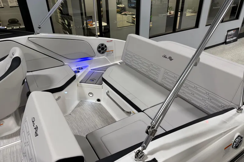 Slide: The Image of 2026 Sea Ray SPX 210 boat interior with sleek seating and modern design. - 8