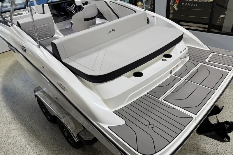 Slide: The Image of 2026 Sea Ray SPX 210 boat interior, featuring sleek seating and modern design elements. - 9