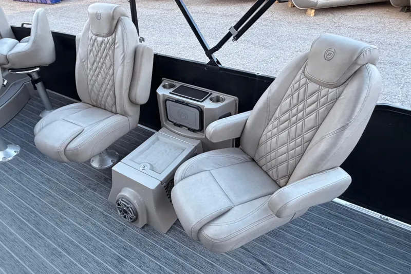 Slide: The Image of Luxurious seating in 2021 Premier 310 Accolade boat with diamond-stitched upholstery. - 13