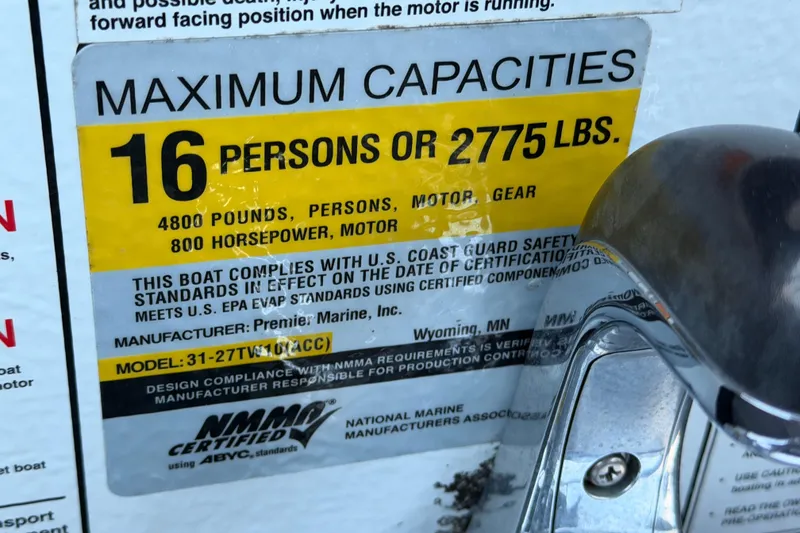 Slide: The Image of 2021 Premier 310 Accolade boat capacity label, 16 persons or 2775 lbs, 800 horsepower. - 16