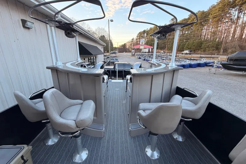Slide: The Image of 2021 Premier 310 Accolade boat interior with swivel seats and modern design. - 18
