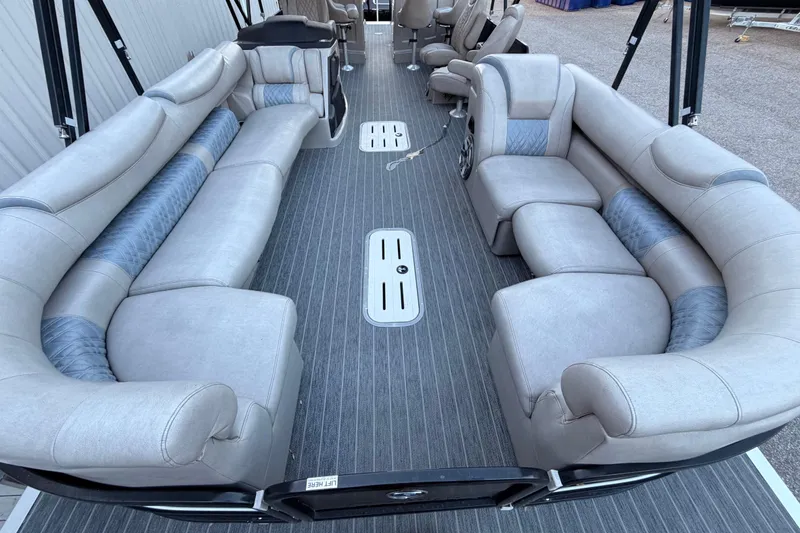 Slide: The Image of Luxurious interior of 2021 Premier 310 Accolade pontoon boat with plush seating. - 21