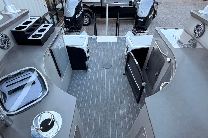 Slide: The Image of 2021 Premier 310 Accolade boat interior with Suzuki engines and modern amenities. - 22